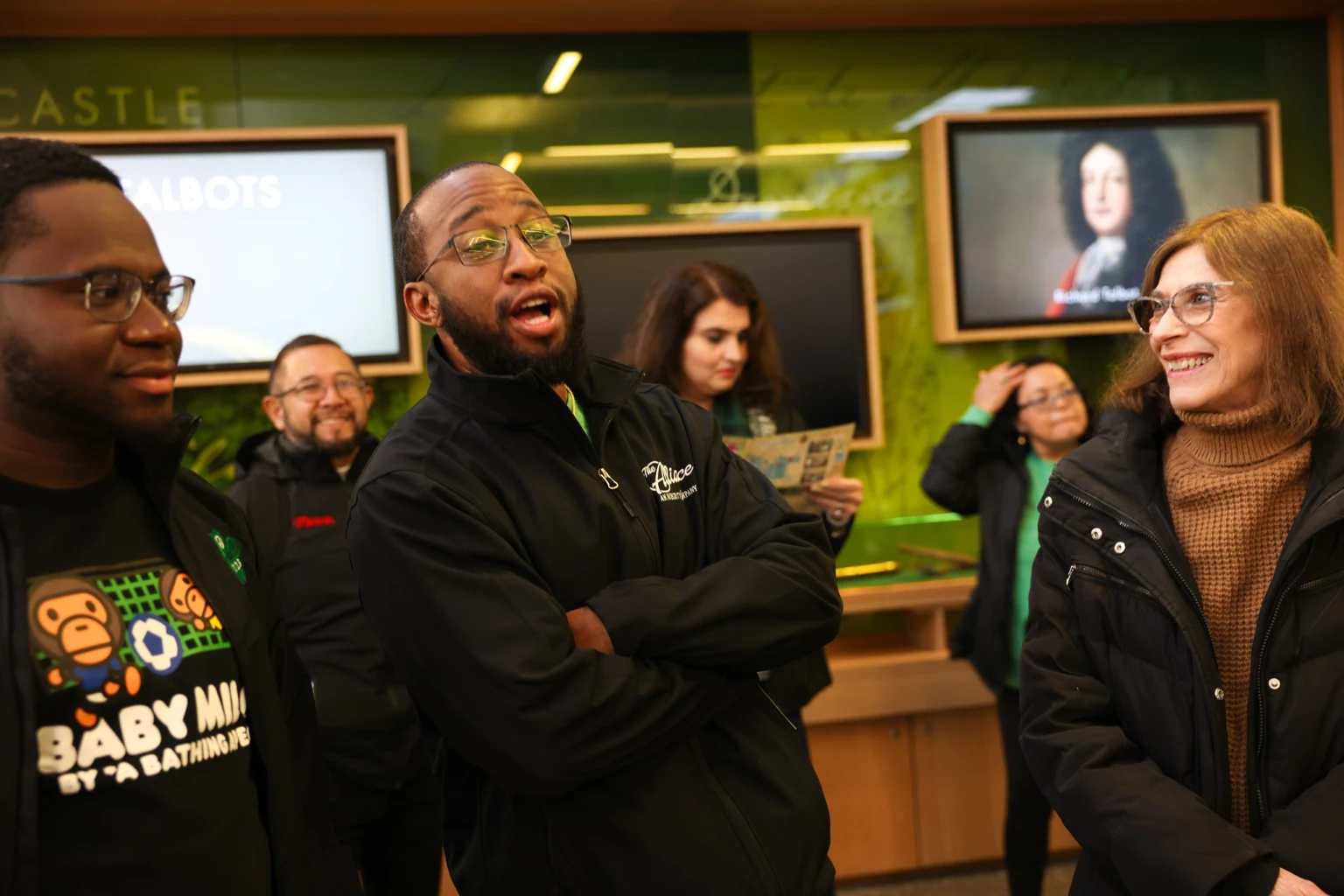 Team members talking during a group visit