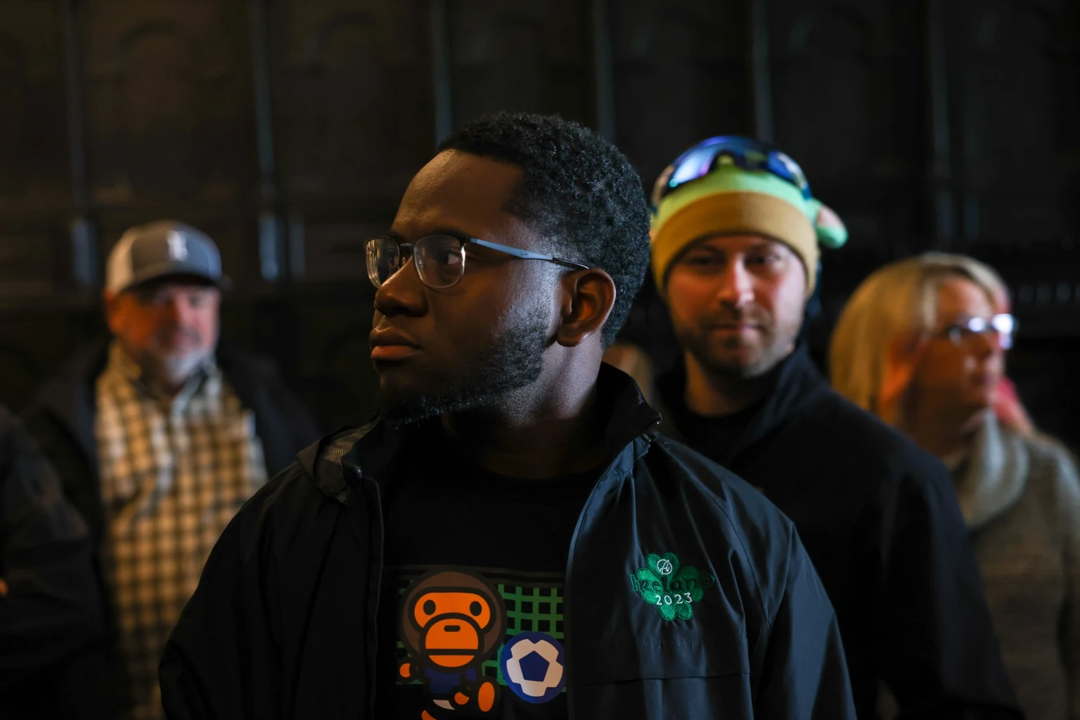 An attendee listening during a group visit