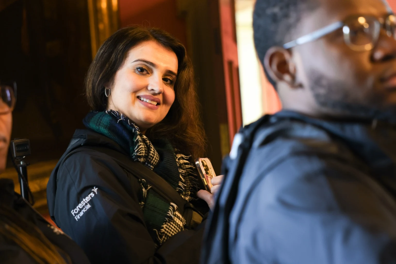 An attendee smiling during a group visit